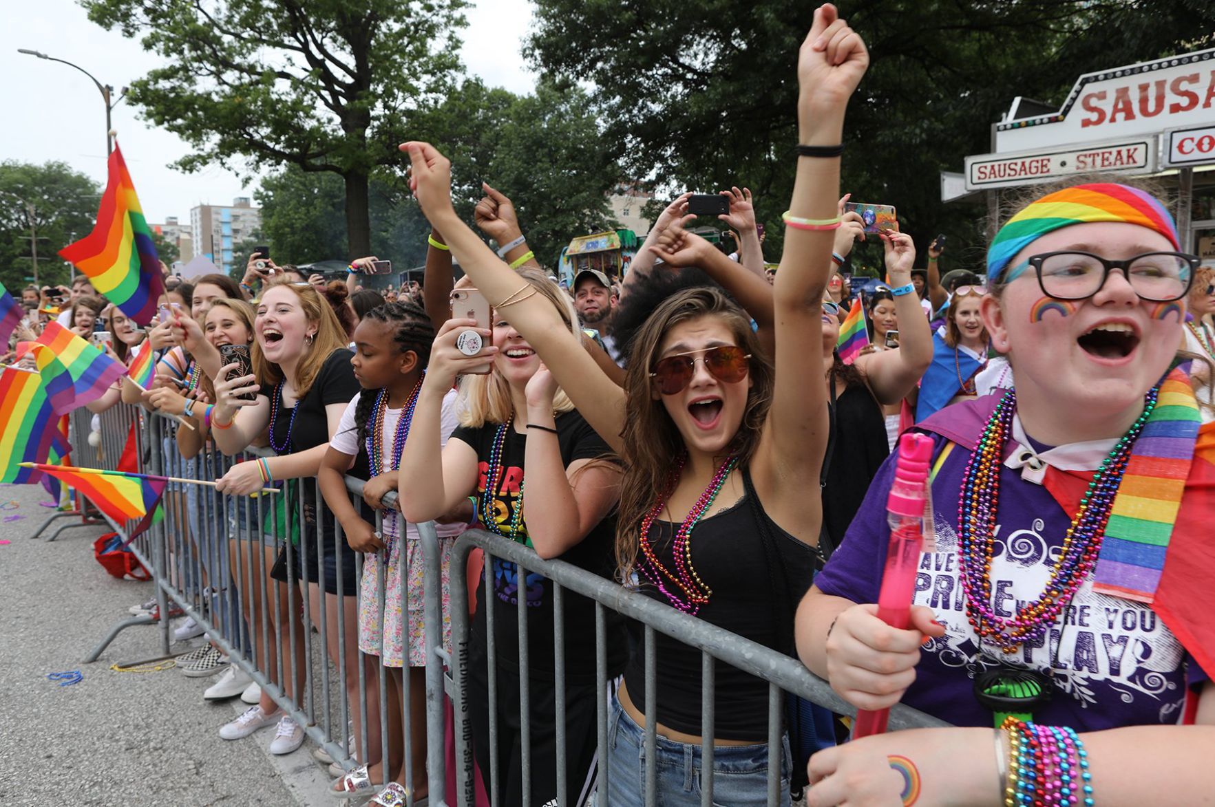 Thousands Watch the Pride Parade downtown